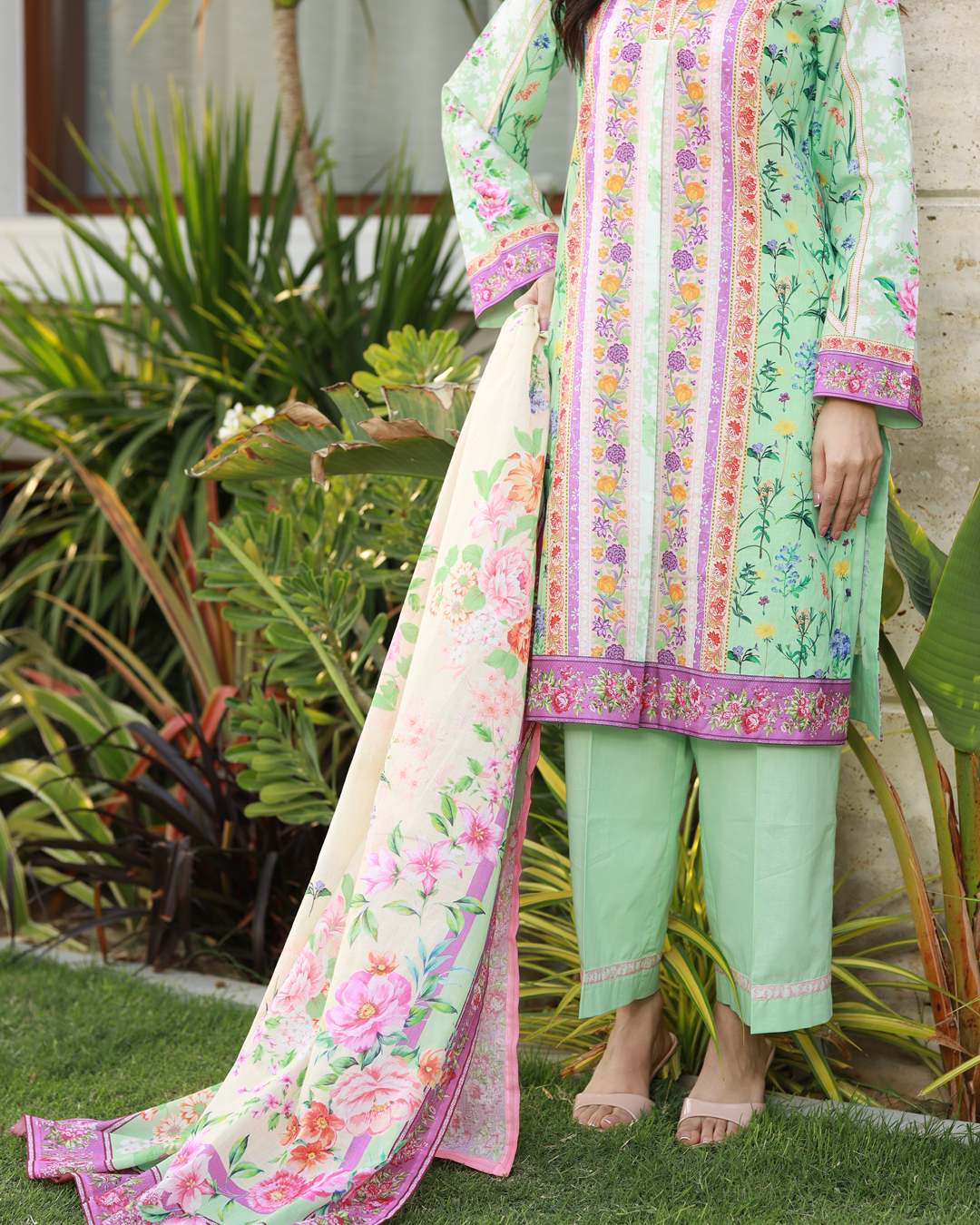 Colors of Confidence Lawn Digital Print Unstitched Suit Set in powder green with vibrant multi-panel floral design, three-piece ethnic outfit for women.