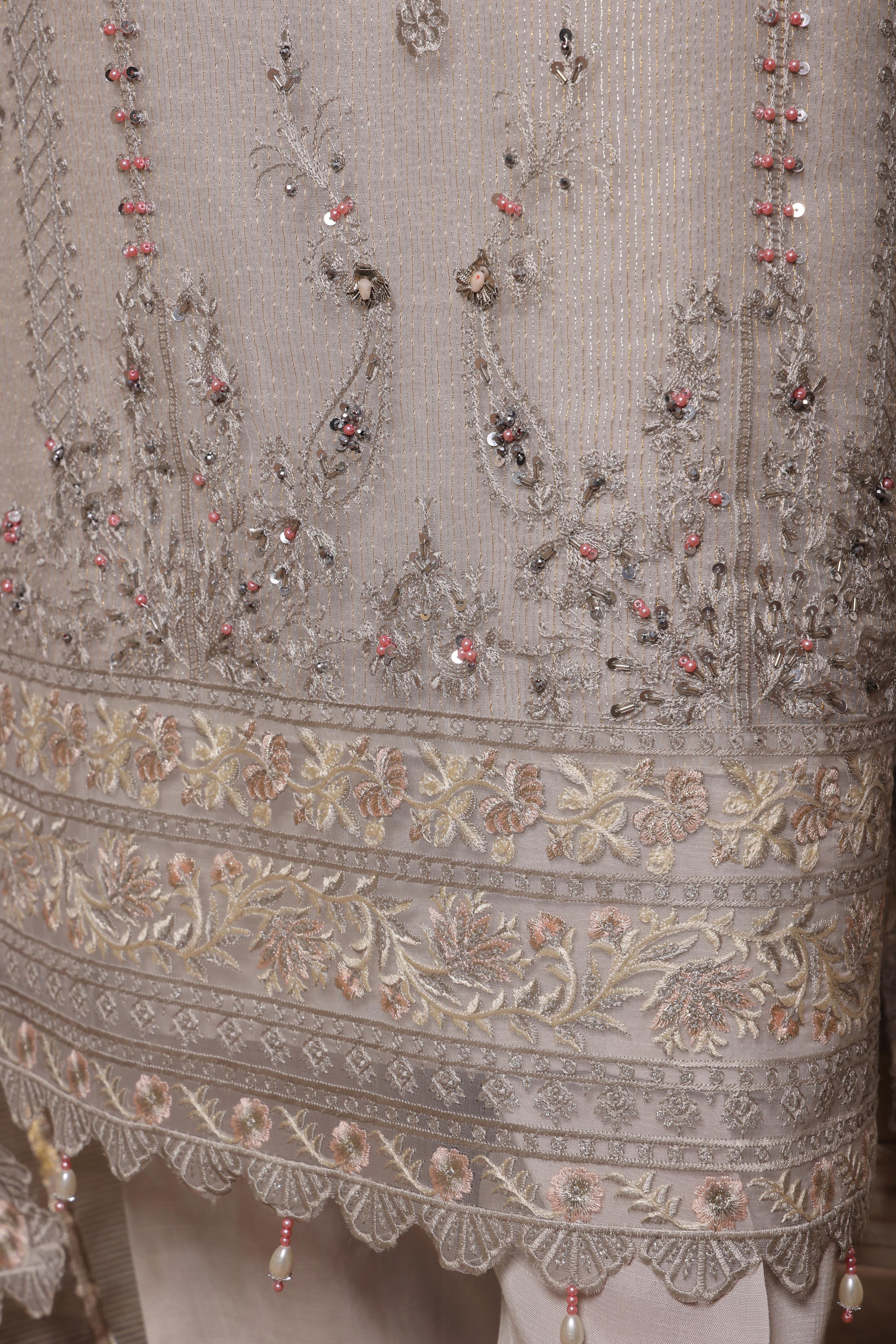 Dressline Red-Rose A Statement Of Elegance Semi Stitched Zari Aiyudiya Net Collection With Staple Lorex Dhari Dupatta & Raw Silk Grip Trousers
