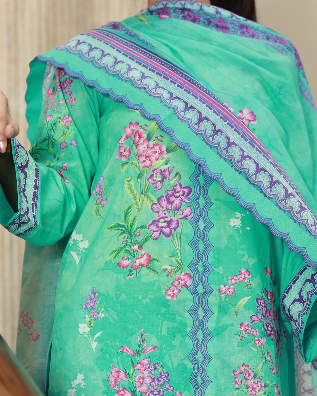 Petal And Sunshine Lawn Digital Print Unstitched Suit Set in sea green with vibrant floral pattern and decorative borders, three-piece outfit for women.