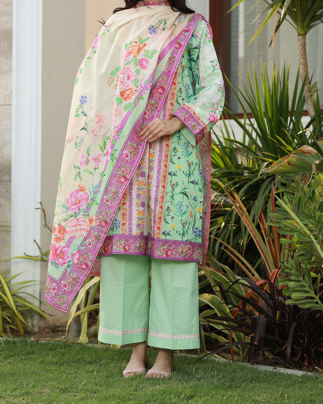 Colors of Confidence Lawn Digital Print Unstitched Suit Set in powder green with vibrant multi-panel floral design, three-piece ethnic outfit for women.