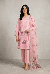 Woman wearing a pink embroidered traditional outfit with a plain background