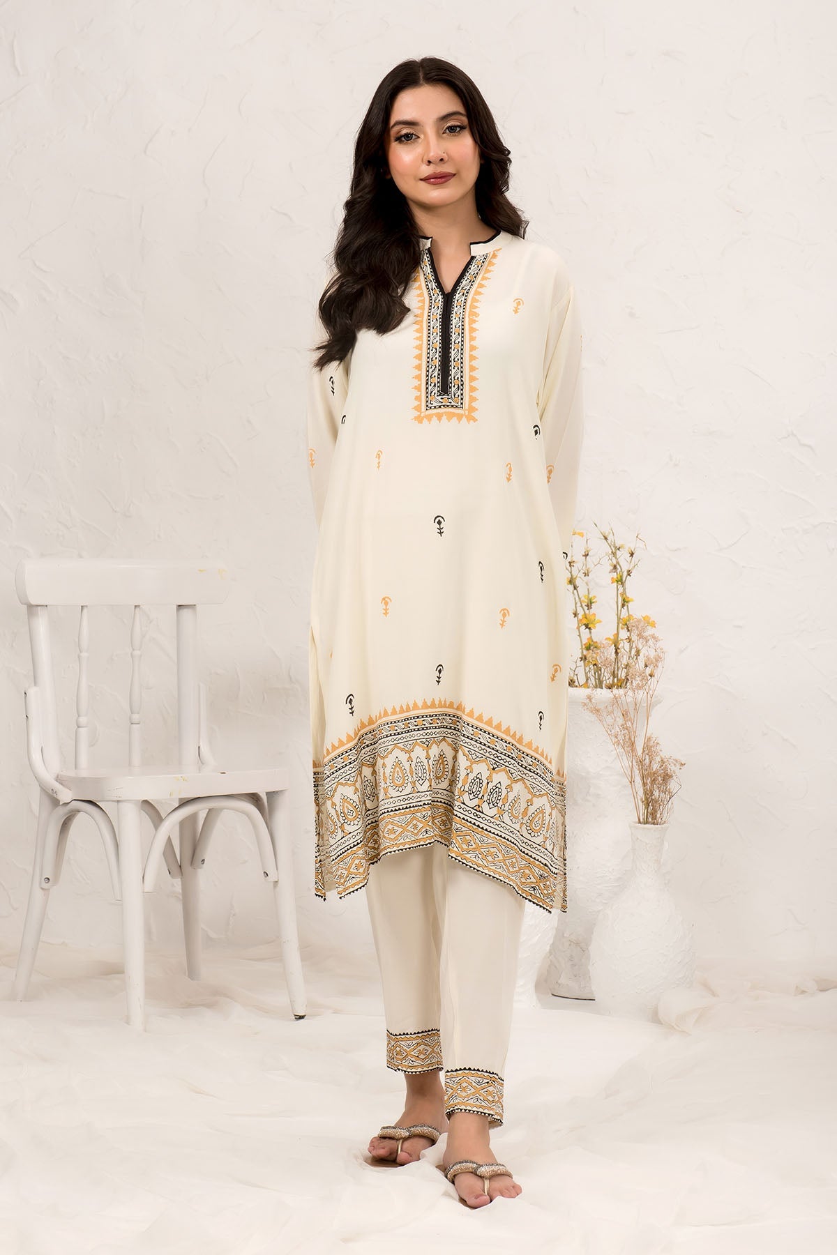 Stylish Cotton Crepe printed 2-piece suit for women, designed with vibrant patterns and lightweight fabric for a chic and comfortable look.