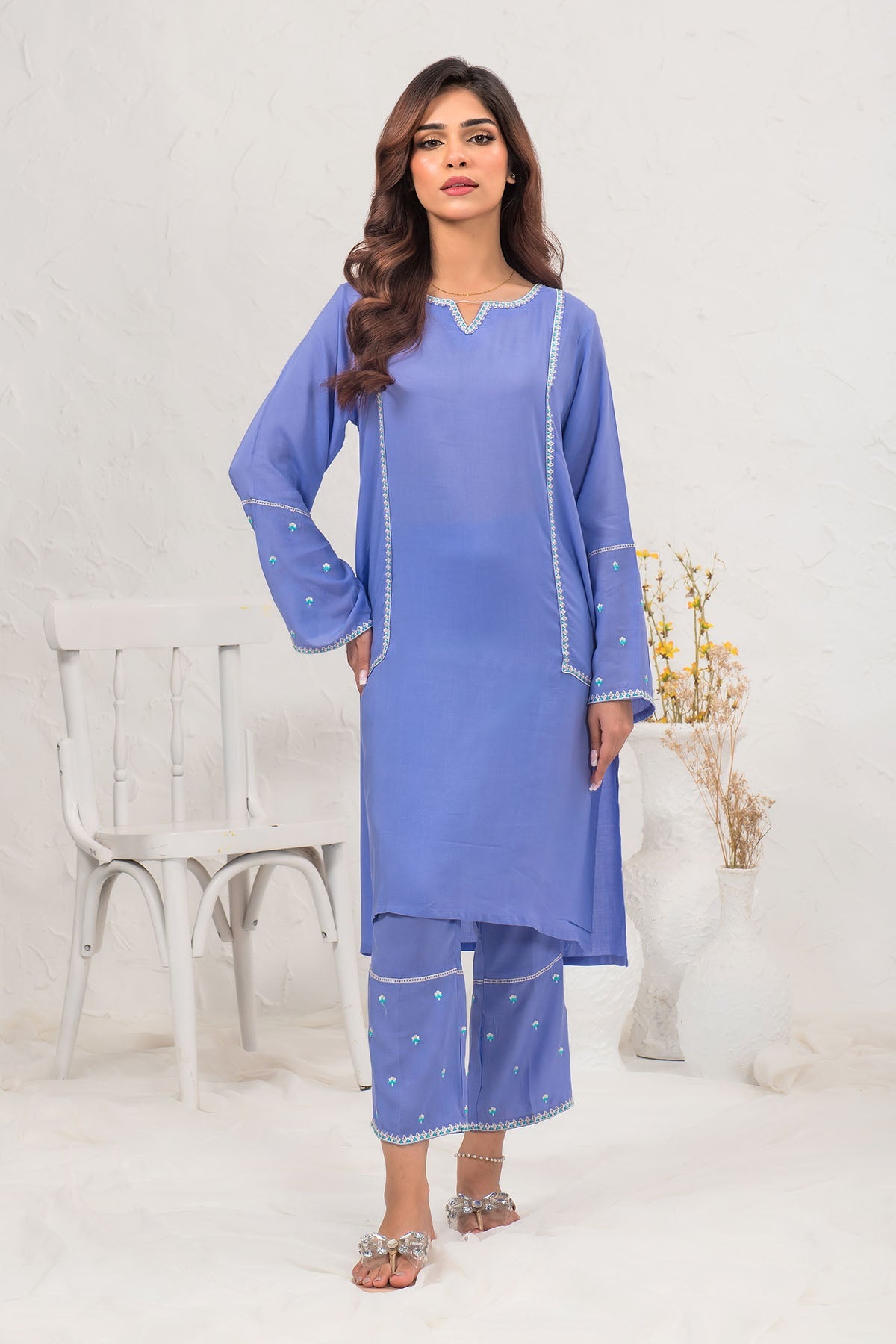 Beautiful Cotton Embroidered 2-piece suit featuring detailed embroidery designs, perfect for adding a touch of elegance and sophistication to your wardrobe.