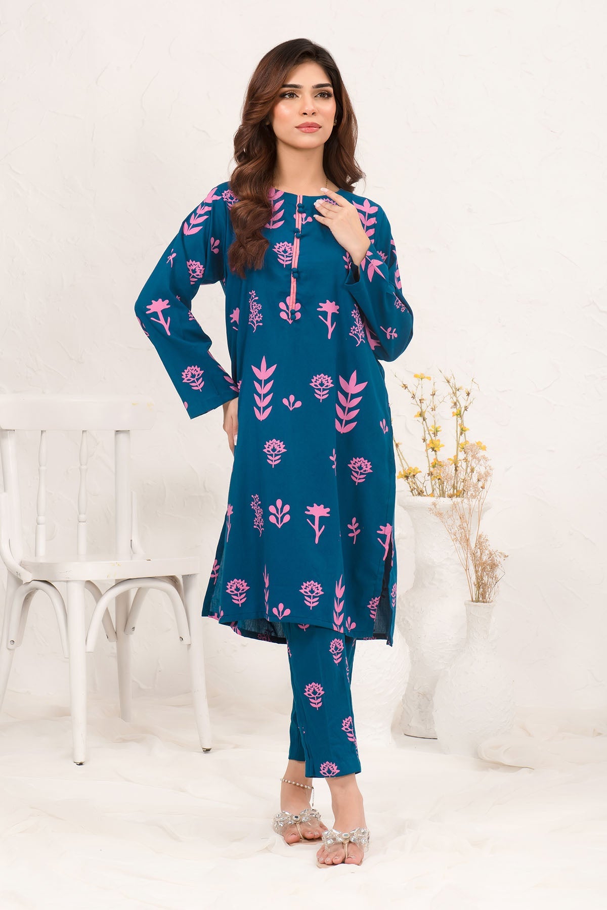 Stylish Cotton Printed 2-piece suit with intricate prints, made from soft and breathable cotton fabric, offering a perfect blend of comfort and fashion.