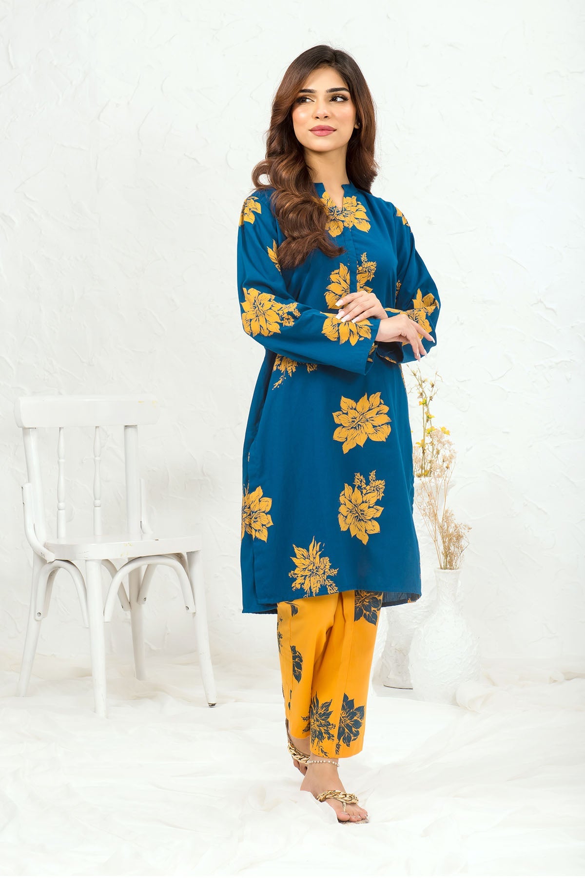 Stylish Cotton Printed 2-piece suit for women in Pakistan, designed with eye-catching prints and soft, breathable fabric for everyday elegance.