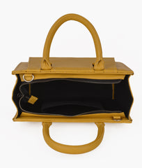 RTW Creation - Gold front pocket handbag