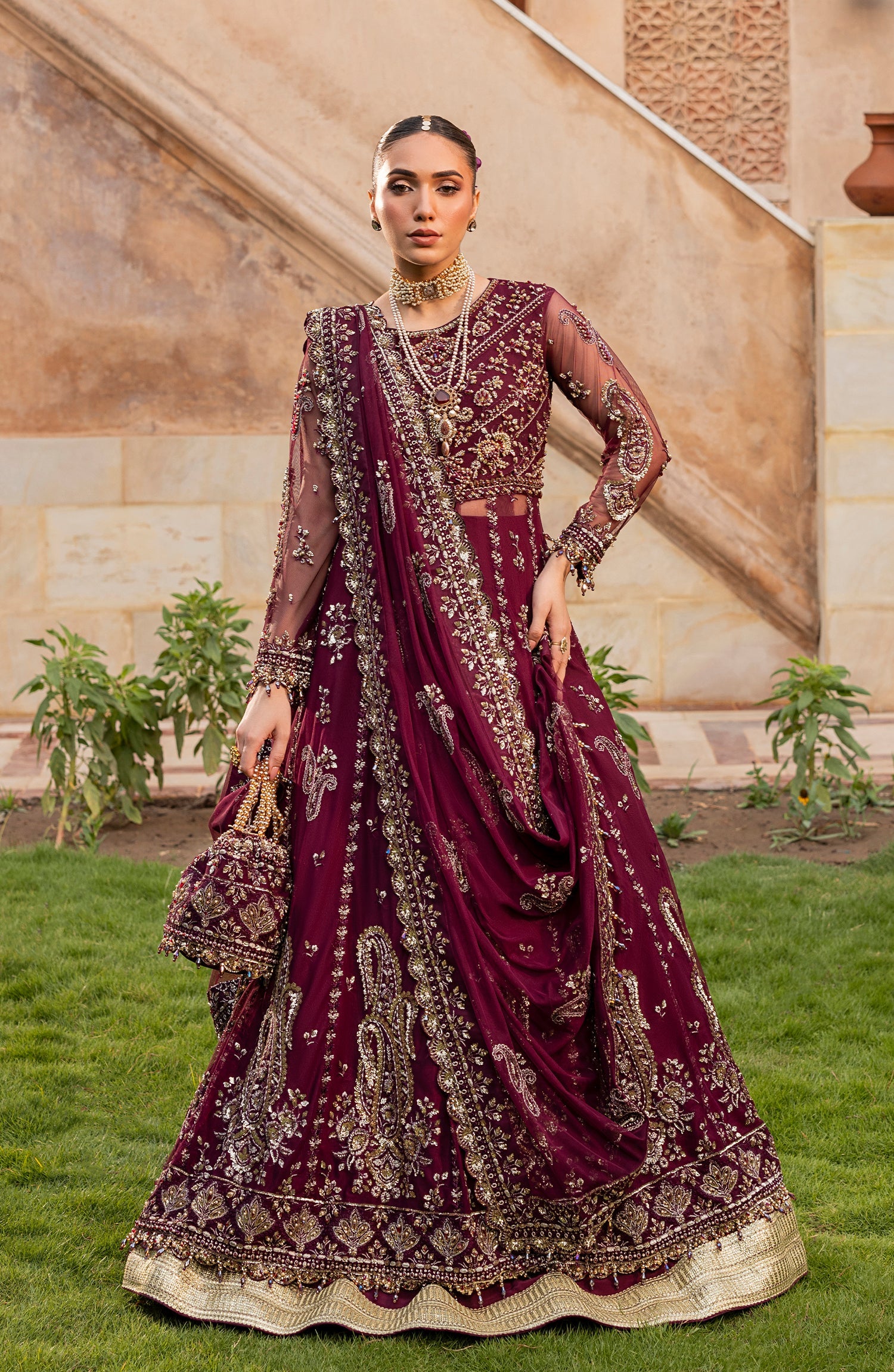 Model front look wearing Aylin Mulberry maxi dress in deep shade