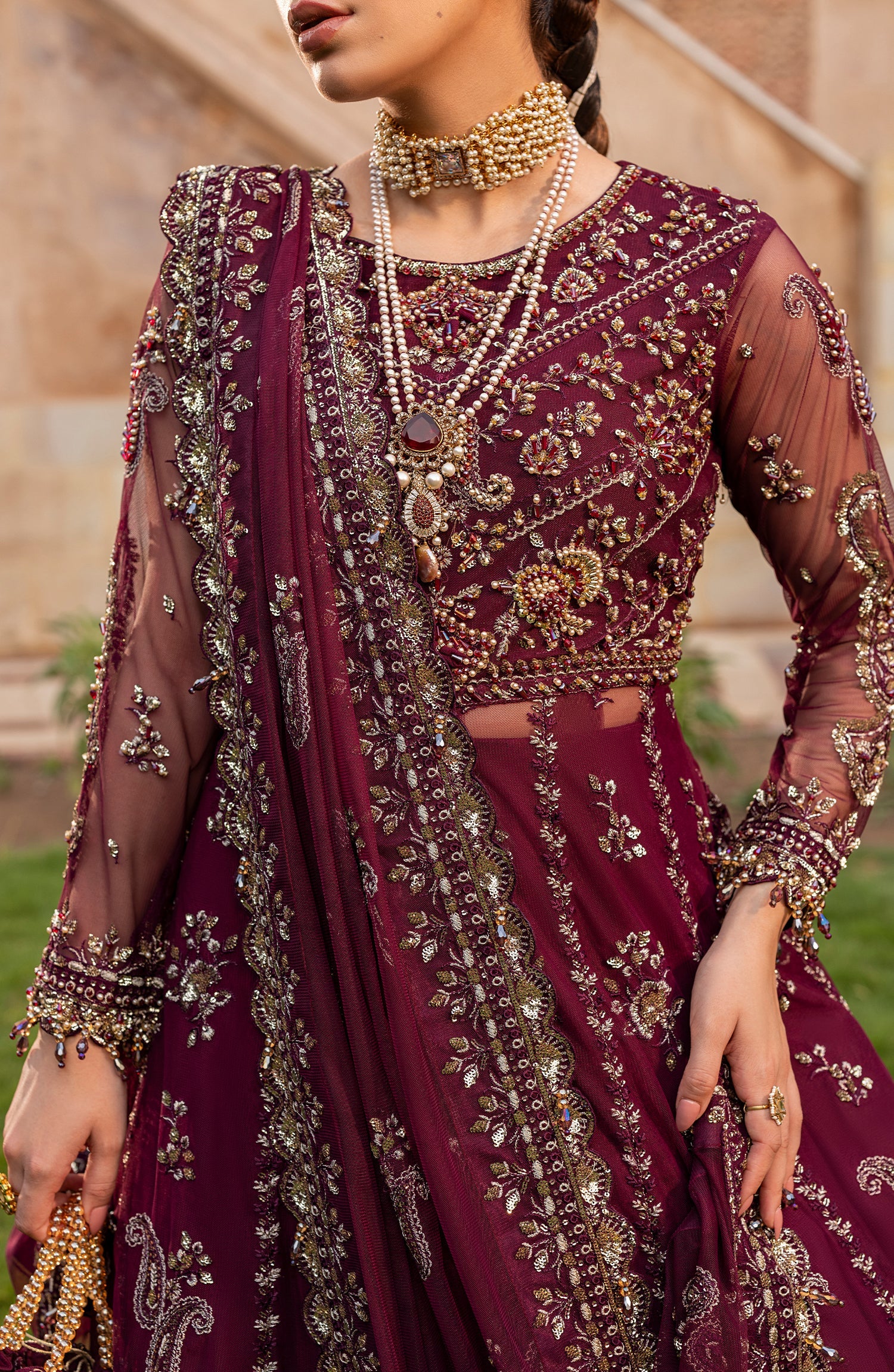 Close-up of model highlighting fabric texture of Aylin Mulberry maxi