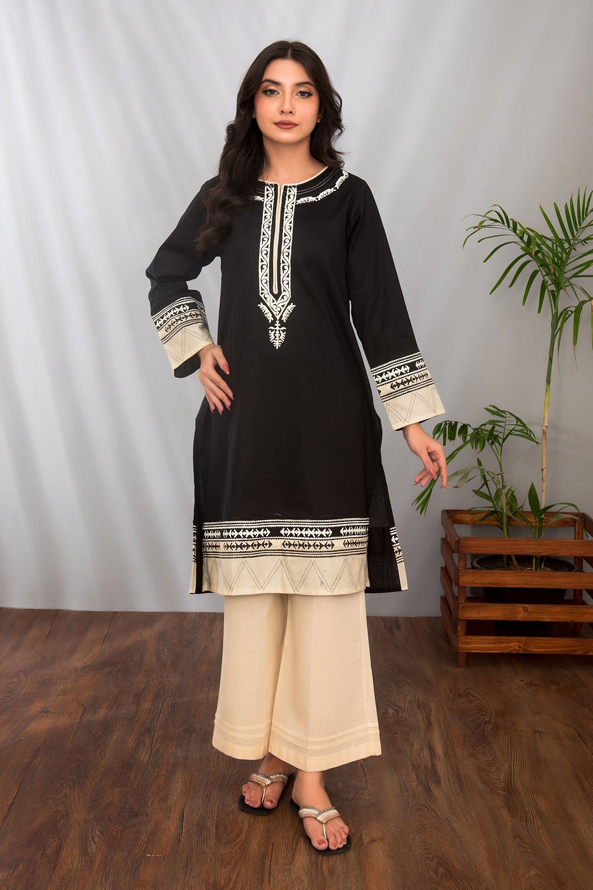 Cotton Printed 2 Pc Suit features a Pakistani cotton dress design with vibrant prints. It is ideal for casual and festive occasions and offers comfort and style.