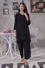 Discover stylish printed cotton suits & classic black cotton suits for women.