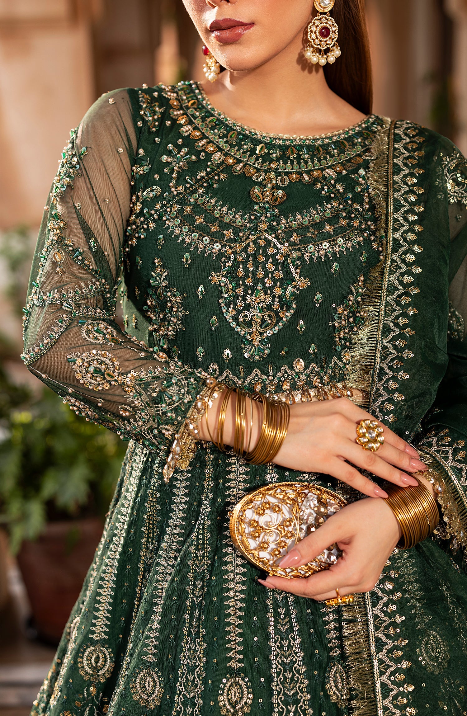 Model front look wearing Aylin emerald maxi with elegant neckline