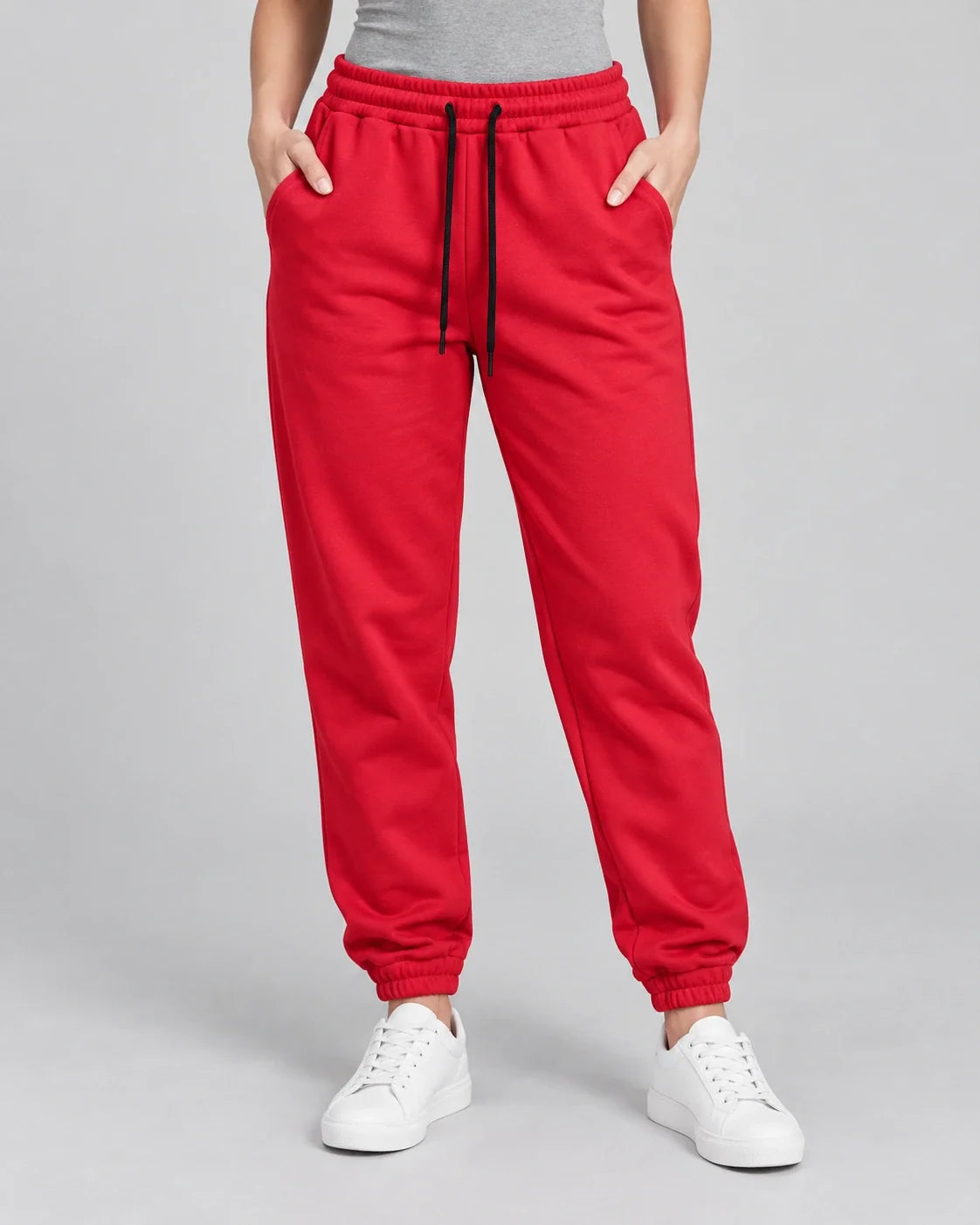 Red Jogger Pant with black drawstrings — studio view 1