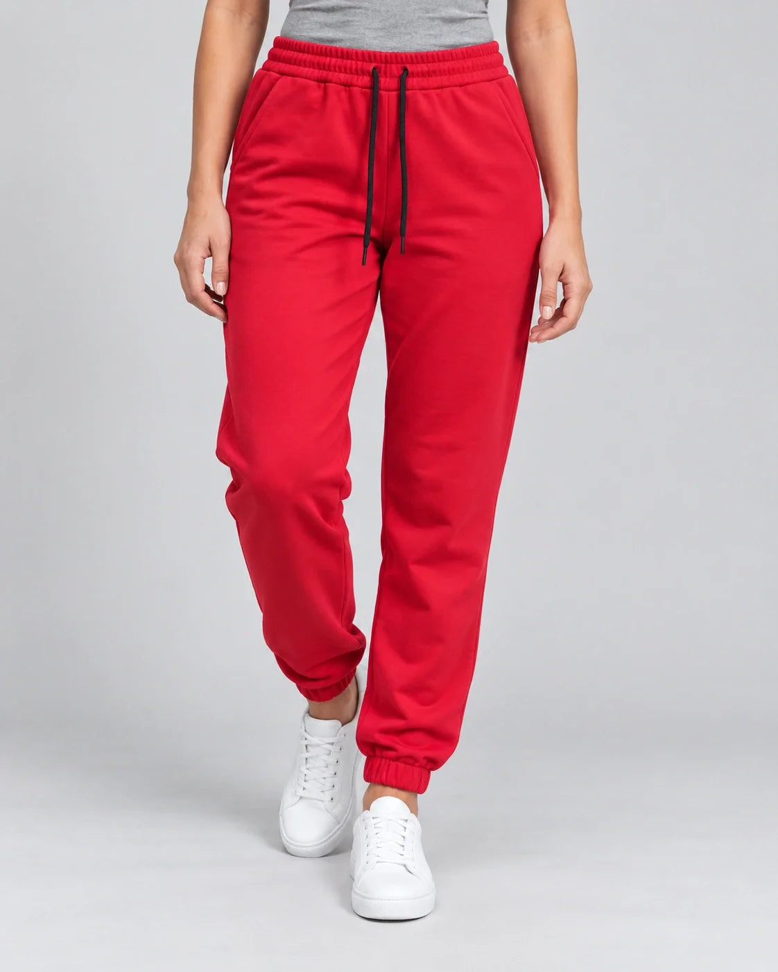 Red Jogger Pant with black drawstrings — studio view 2