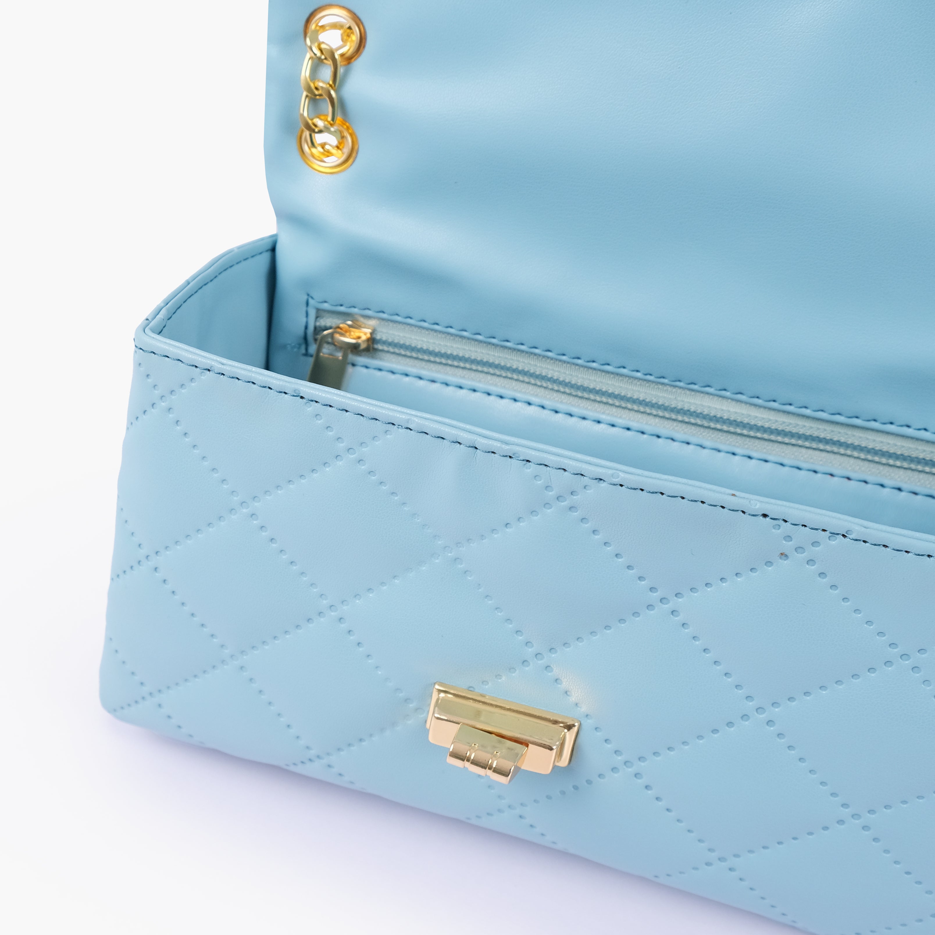 RTW Creation - Sky Blue quilted mini bag with chain